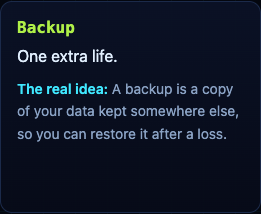 The Backup power-up card on the Tank City Reboot page: one extra life, and the real idea, a backup is a copy of your data kept somewhere else so you can restore it